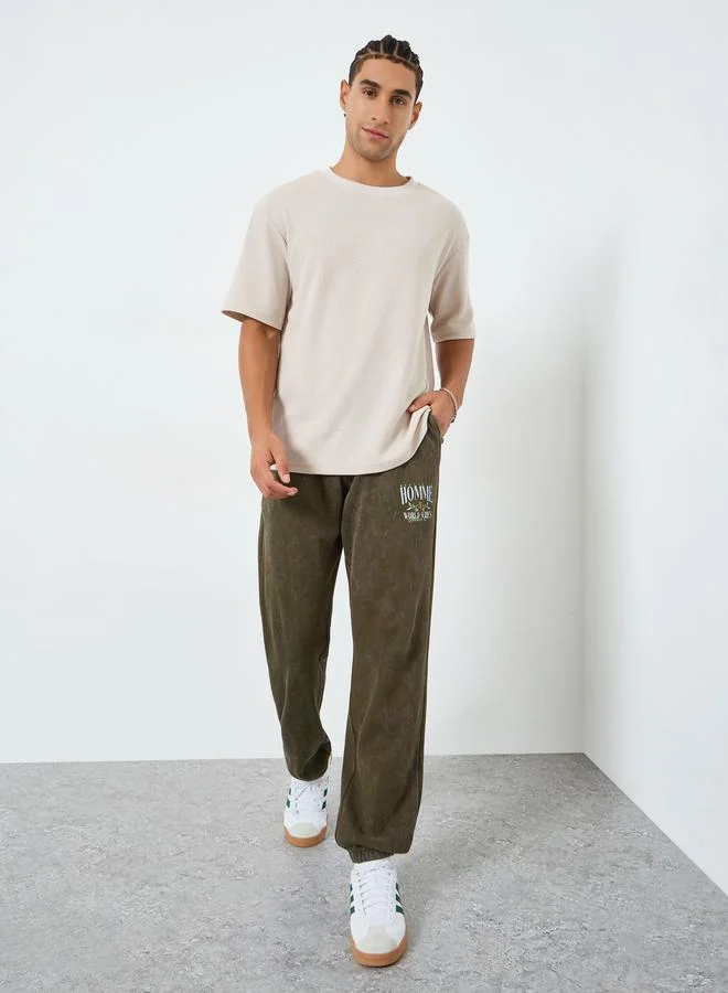 Men Olive Graphic Print Relaxed Fit Joggers
